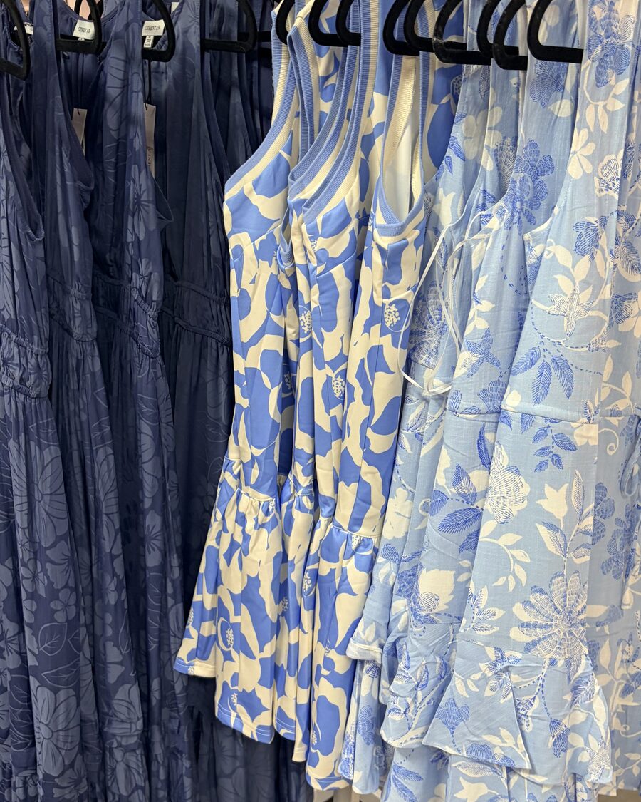 Dresses on display inside Mystique Boutique